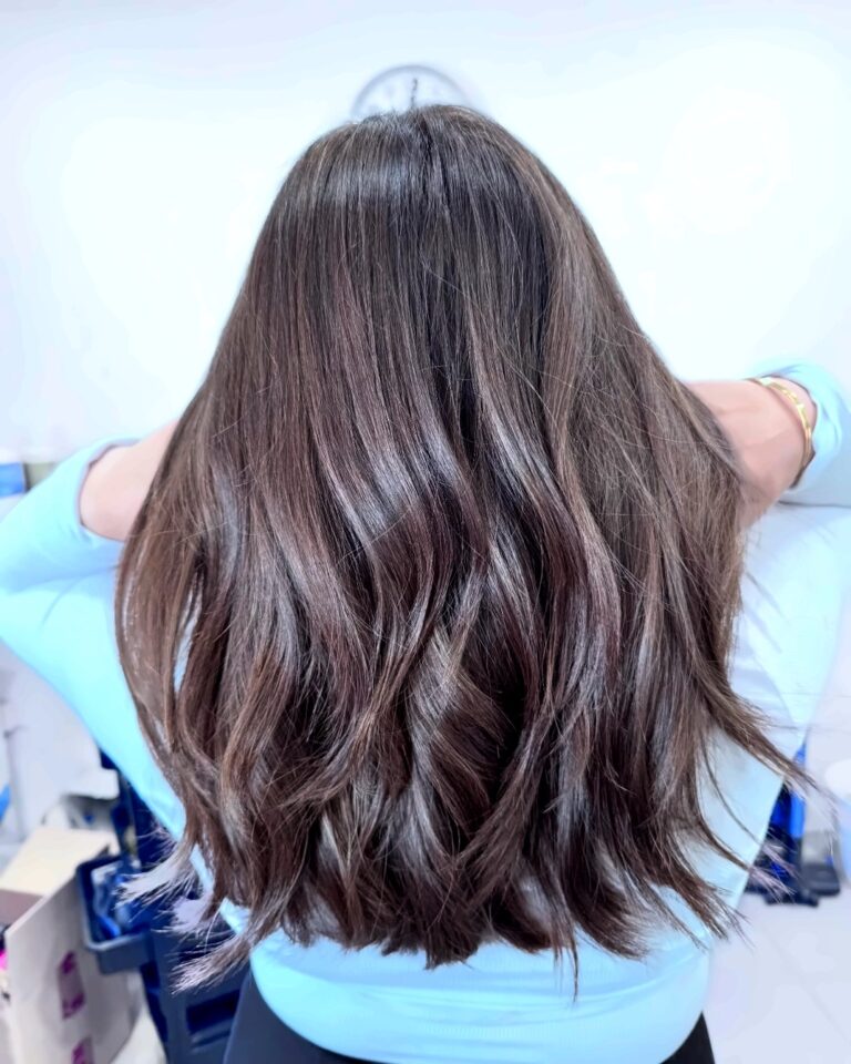 Rich chocolate brown colour with soft waves by Hair By Neetu
