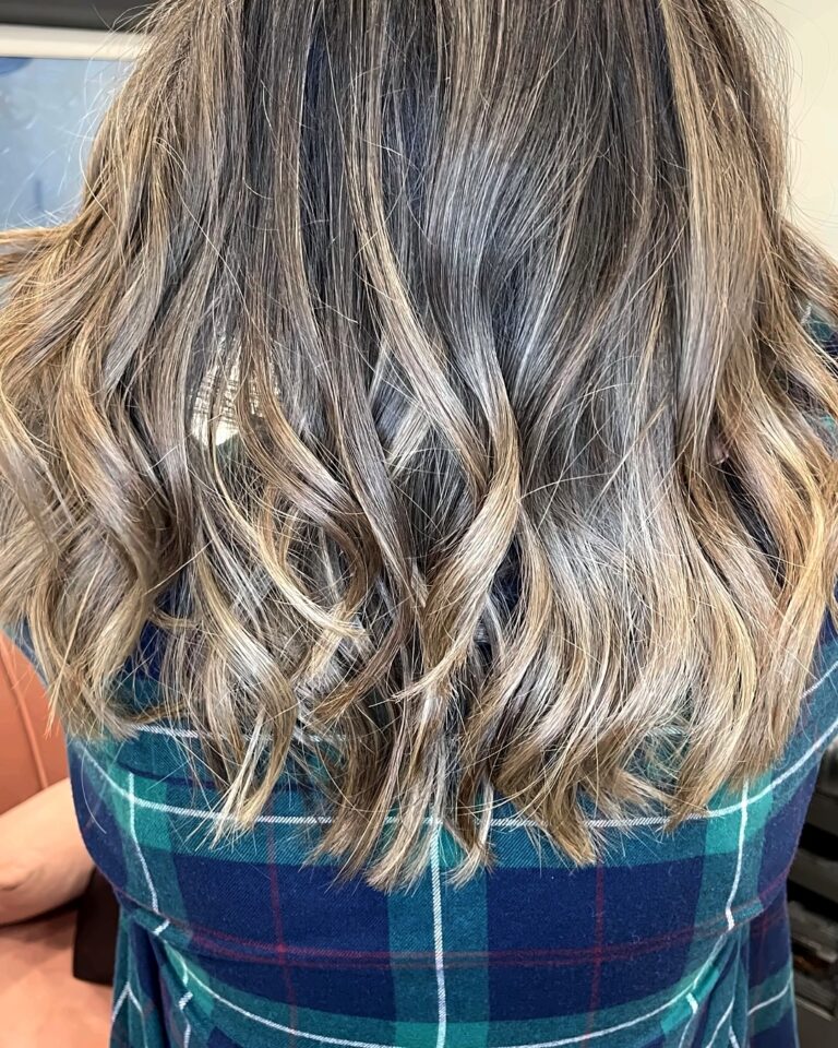 Beige blonde balayage with tousled waves